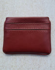 Cherry red 5 card wallet made from vegan cactus leather with subtle piping detail on edge
