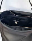 Cactus leather tote back with curved bottom panel, and adjustable buckled strap