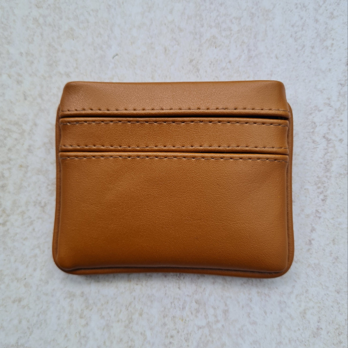 Caramel tan 5 card wallet made from vegan cactus leather with subtle piping detail on edge