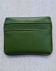 Green 5 card wallet made from vegan cactus leather with subtle piping detail on edge