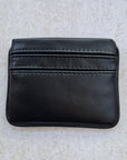 Black 5 card wallet made from vegan cactus leather with subtle piping detail on edge