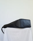 Cactus leather tote back with curved bottom panel, and adjustable buckled strap