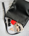Cactus leather Parton tote with curved base and adjustable buckle strap
